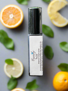 Skincare perfume spray  bottle with citrus fruits and leaves on a gray background