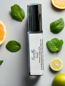 Spray bottle with mint leaves and citrus fruits on a light gray background