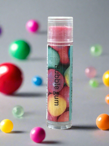 Bubble gum container with colorful gumballs on a gray background